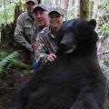 Linda, Darrell and Ryan with Lindas 2nd bear, and absolute giant well over 7 feet.